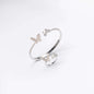 Set Bratara și Inel Butterfly Dream cu detalii fluture și microcristale strălucitoare, design elegant.