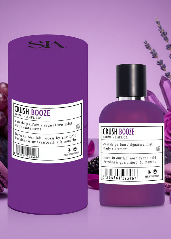 Apa de Parfum 100ml CRUSH BOOZE, sticlă mov și cutie cadou mov pe fundal violet, parfum intens pentru el și ea Main image