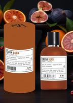 Apa de Parfum CRUSH BURN oriental fructat 100ml, sticlă și cutie maro cu fructe exotice în fundal