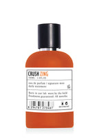 CRUSH ZING Apa de parfum 100ml, parfum exotic fructat floral pentru ea, sticlă portocalie elegantă pe fundal alb