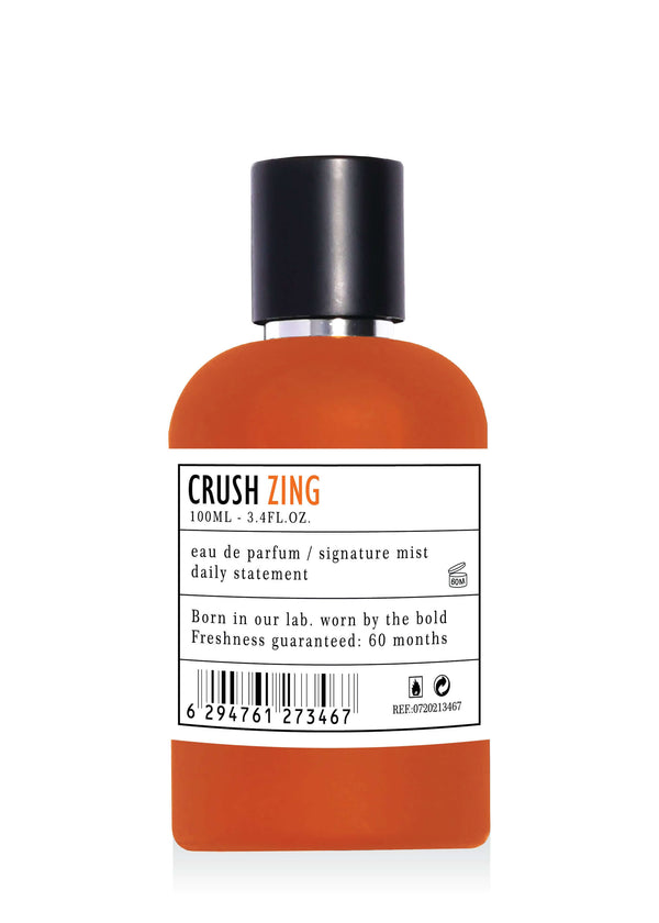 CRUSH ZING Apa de parfum 100ml, parfum exotic fructat floral pentru ea, sticlă portocalie elegantă pe fundal alb