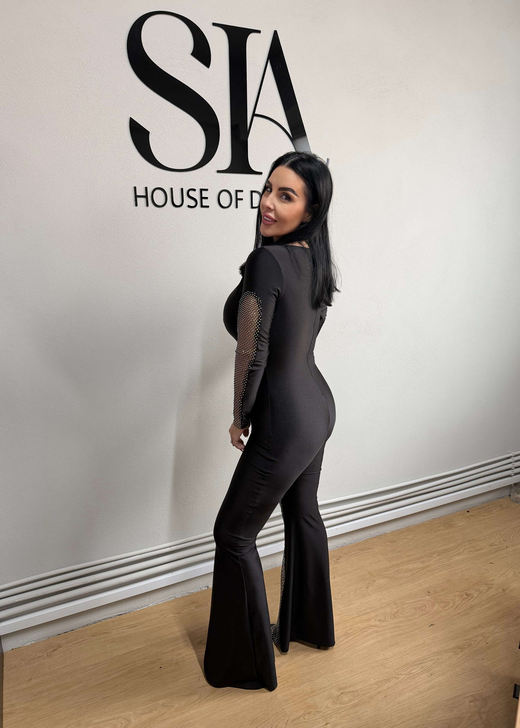 Salopetă neagră din lycra SIA cu inserții din plasă strălucitoare