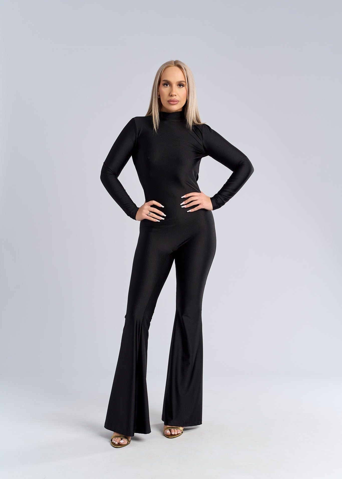 Salopetă neagră din lycra cu spate gol seducător - "SINFUL BACK"