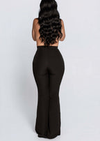 Pantaloni SIA Contour negri cu talie înaltă și croi conic în partea superioară, văzuți din spate pe model femeie