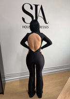 Salopetă neagră SIA Sinful Back din lycra cu spate gol, eleganță minimalistă și senzualitate absolută.