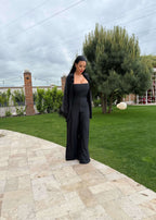 Compleu Bling Miray set 3 piese lycra cu cristale, bustieră și pantaloni evazați negri eleganți, model în grădină