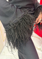 Salopeta Bling Temptation neagră, material elastic cu cristale și mâneci evazate cu pene decorative, detaliu lateral